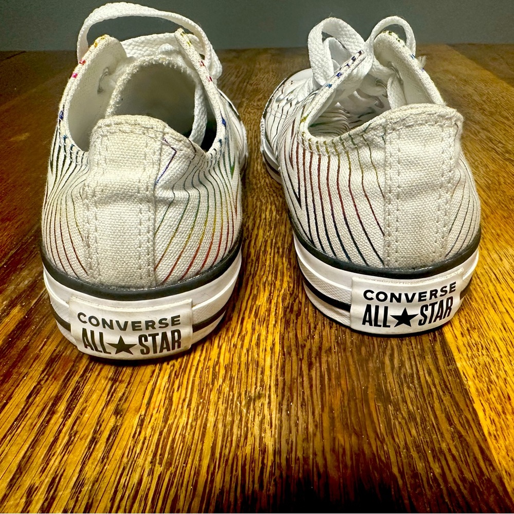 Converse All Star Size 7. White with multicolored stars. Worn a few times.